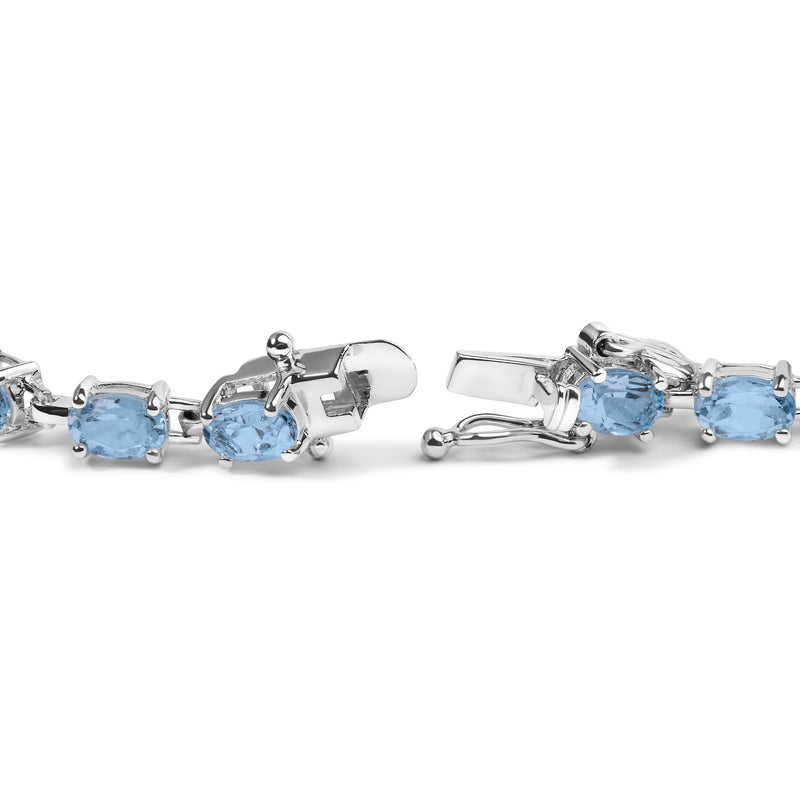 .925 Sterling Silver 11.0 Cttw Oval Shaped Created Light Blue Topaz Link Bracelet - 7 inch