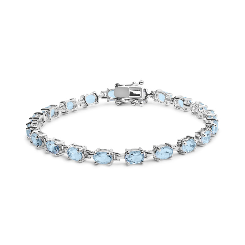 .925 Sterling Silver 11.0 Cttw Oval Shaped Created Light Blue Topaz Link Bracelet - 7 inch