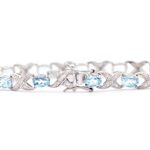 11.3 ctw Blue Topaz & Diamonds Rhodium Plated Designer Bracelet 7.75 in