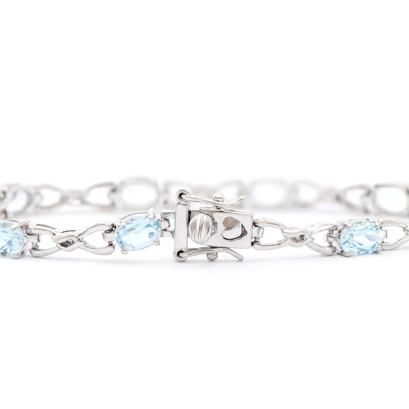 8.55 ctw Blue Topaz Rhodium Plated Designer Bracelet 7.6 in