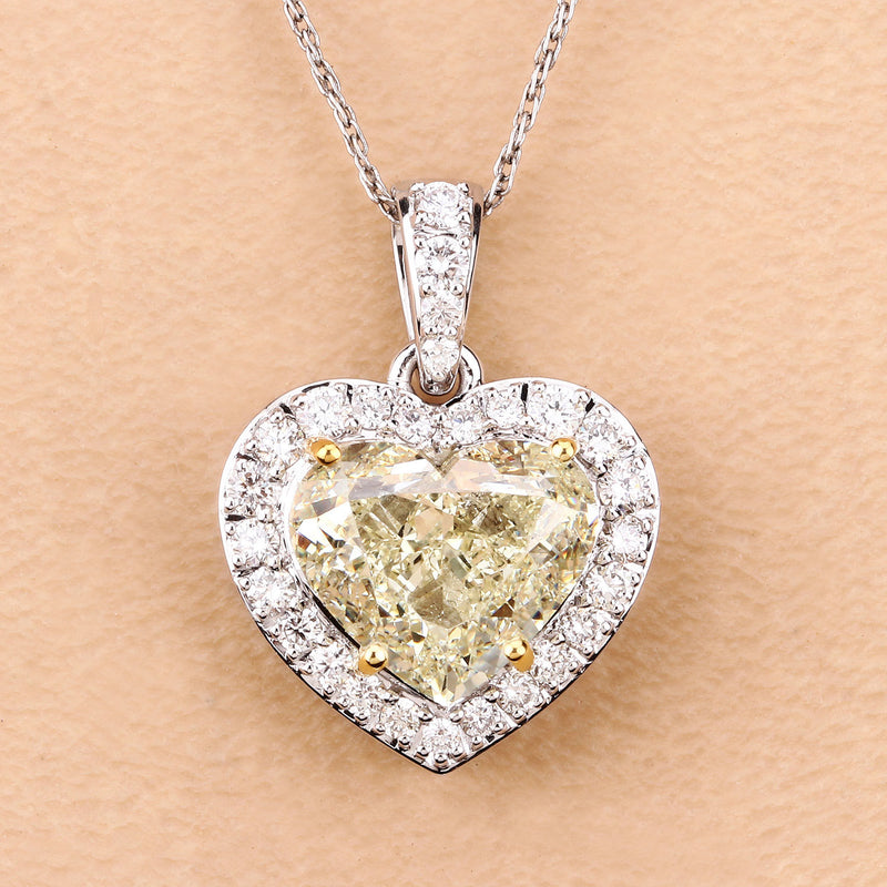 IGI Certified 4.51 Carat Genuine Light Yellow Diamond Center and 0.45cttw White Diamond 18K White Gold Pendant (4.96cttw)