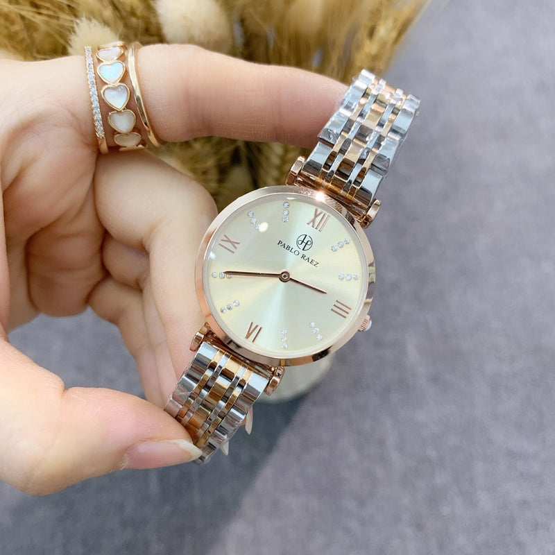 Luxury Stainless Steel Women's Watch with Japan Quartz Movement and Waterproof Design.