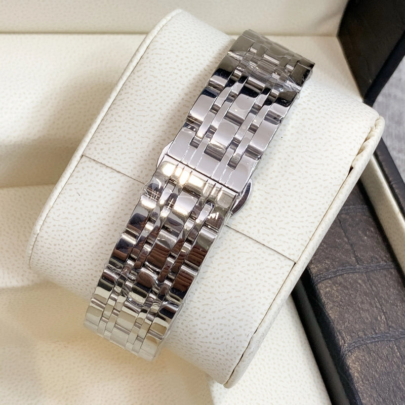 Luxury Square Steel Women's Watch with High Quality Date Display and Sleek Silver Design.