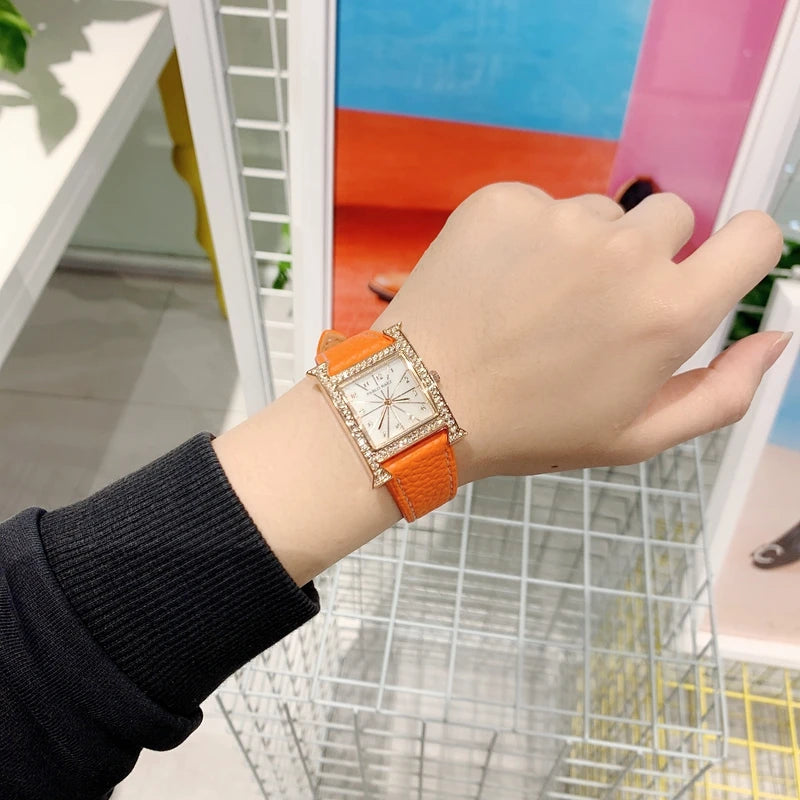 Luxury Diamond Women's Wristwatch with Leather Band and Orange Jewelry Details