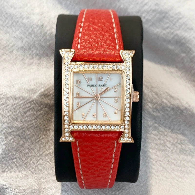 Luxury Diamond Women's Wristwatch with Leather Band and Orange Jewelry Details