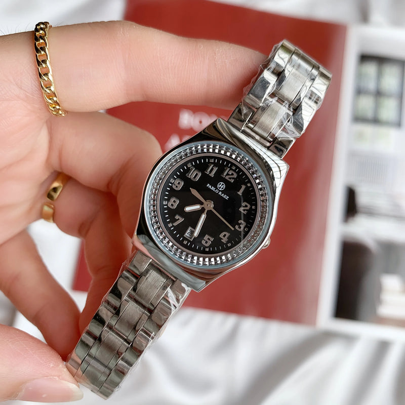 Luxury Silver Steel Watch with Butterfly Lock & Numberal Marks - Waterproof, Ideal for Women.