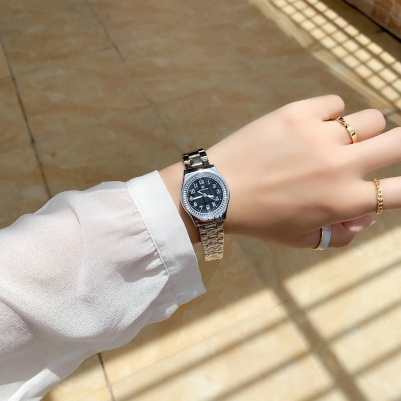 Luxury Silver Steel Watch with Butterfly Lock & Numberal Marks - Waterproof, Ideal for Women.