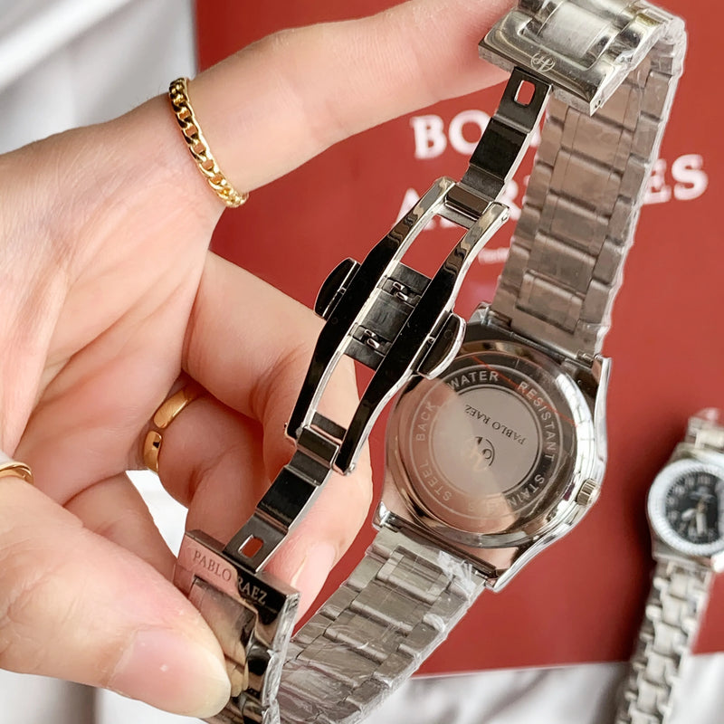 Luxury Silver Steel Watch with Butterfly Lock & Numberal Marks - Waterproof, Ideal for Women.