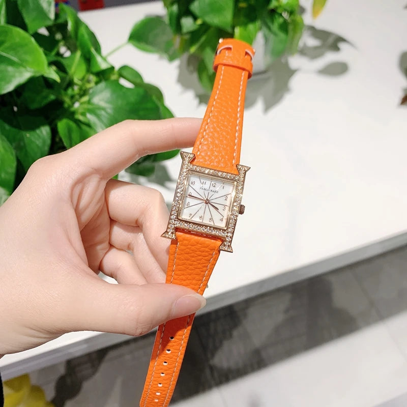 Luxury Diamond Women's Wristwatch with Leather Band and Orange Jewelry Details