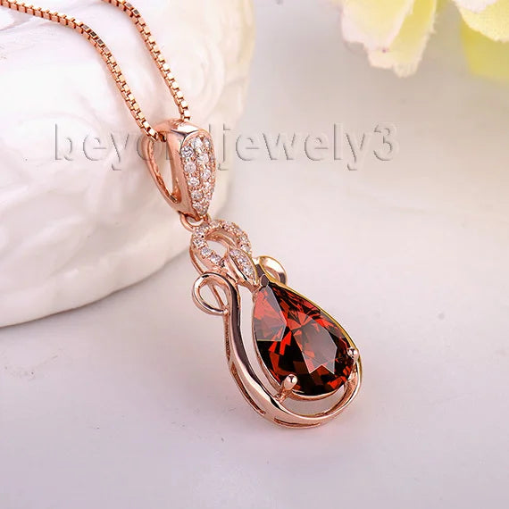 14K Rose Gold Garnet Pendant.