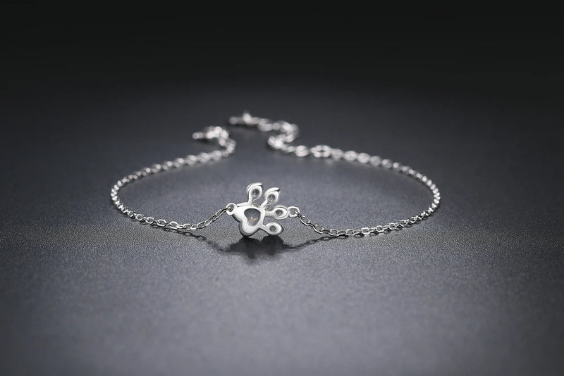 925 Sterling Silver Paw Print Charm Bracelet with Clear Quartz for Women.