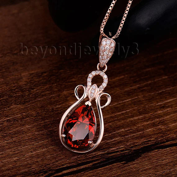 14K Rose Gold Garnet Pendant.