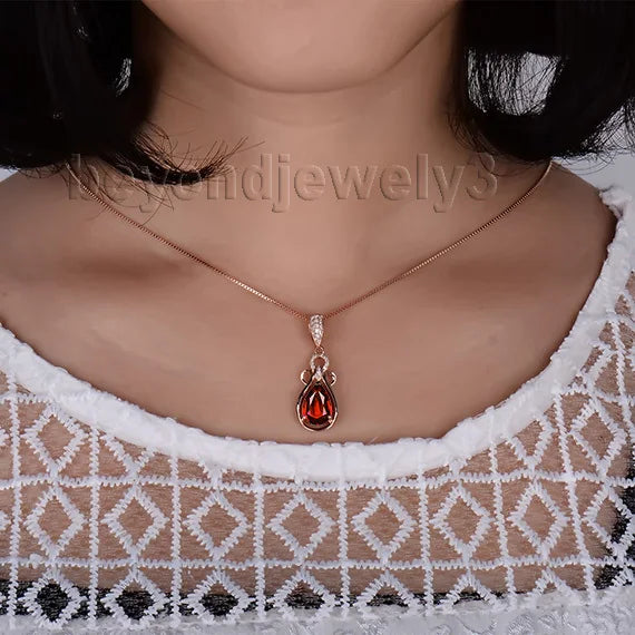 14K Rose Gold Garnet Pendant.