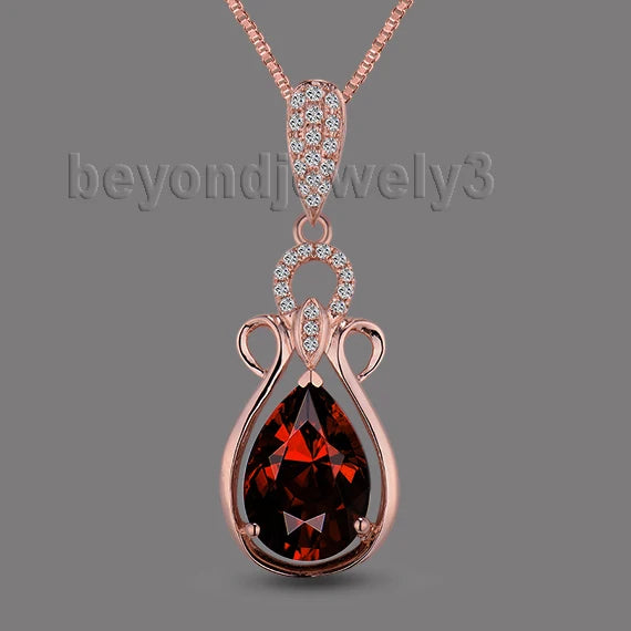 14K Rose Gold Garnet Pendant.