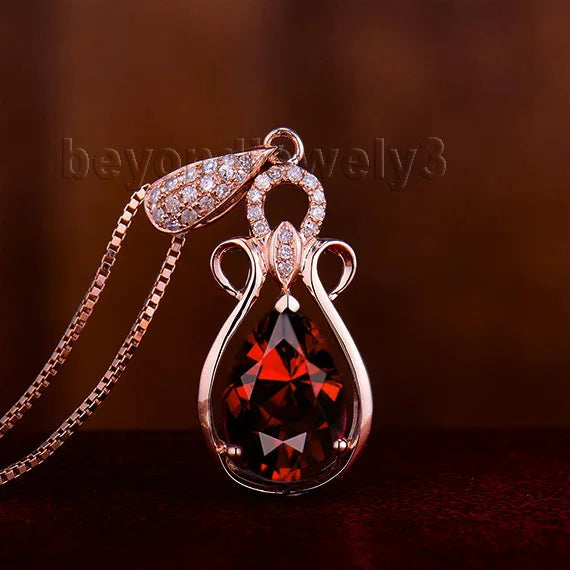 14K Rose Gold Garnet Pendant.