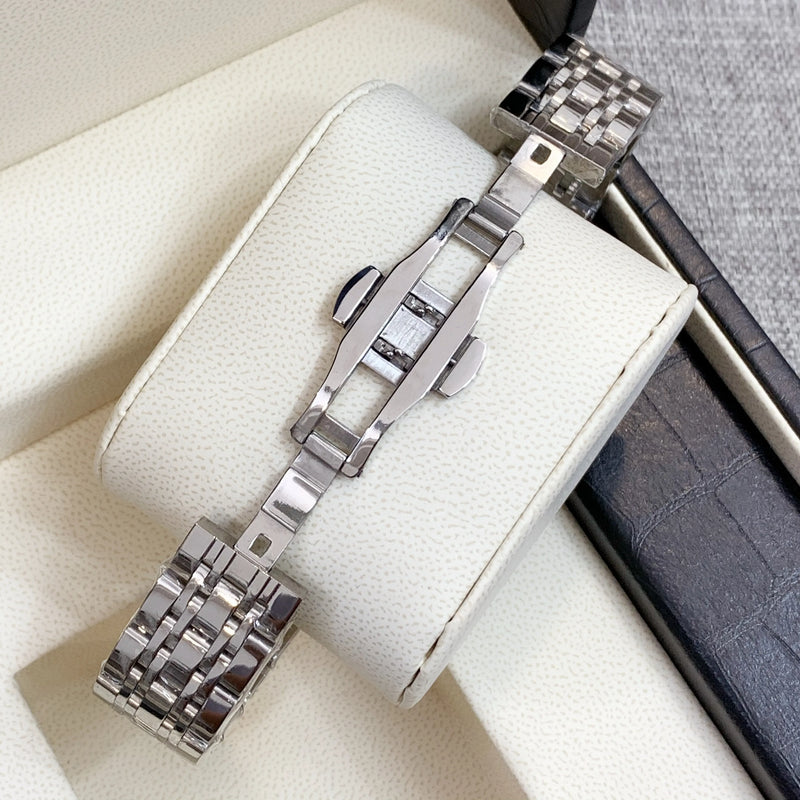 Luxury Square Steel Women's Watch with High Quality Date Display and Sleek Silver Design.