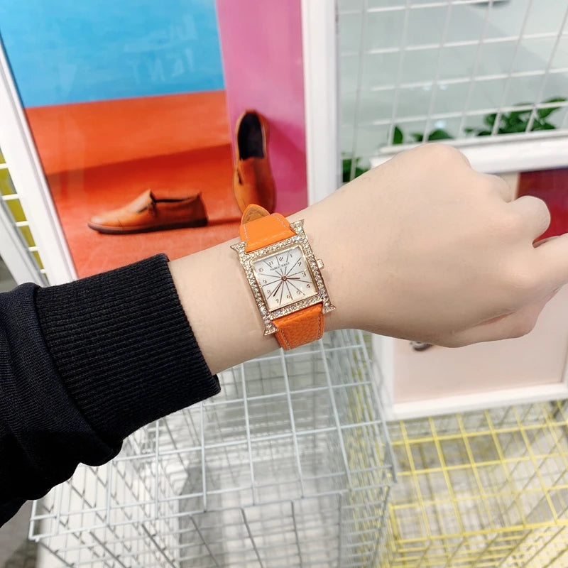 Luxury Diamond Women's Wristwatch with Leather Band and Orange Jewelry Details