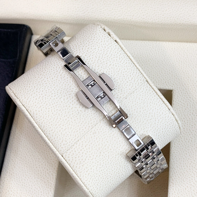 Luxury Silver Square Roman Analog Watch for Women: Elegant, Top Quality & Unique.