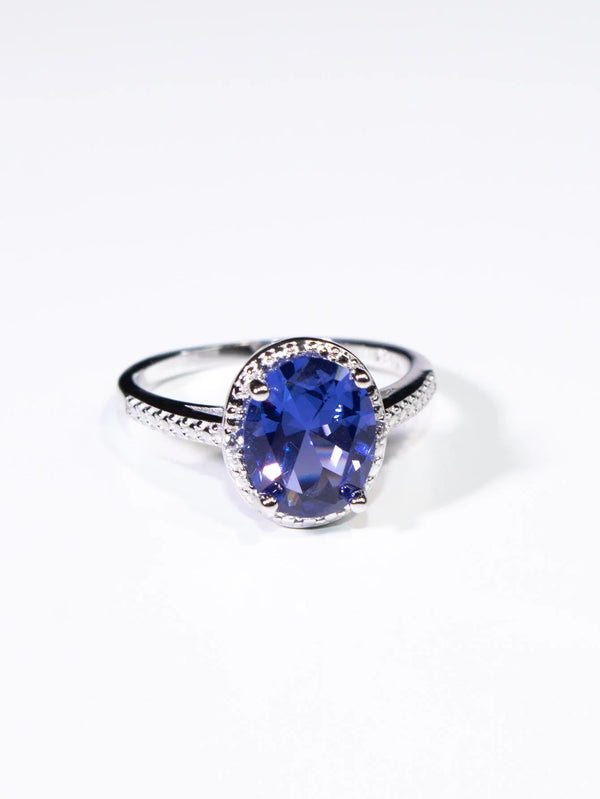 19.25ctw Tanzanite Oval Ring Prong Setting with Paved Diamonds  for Woman