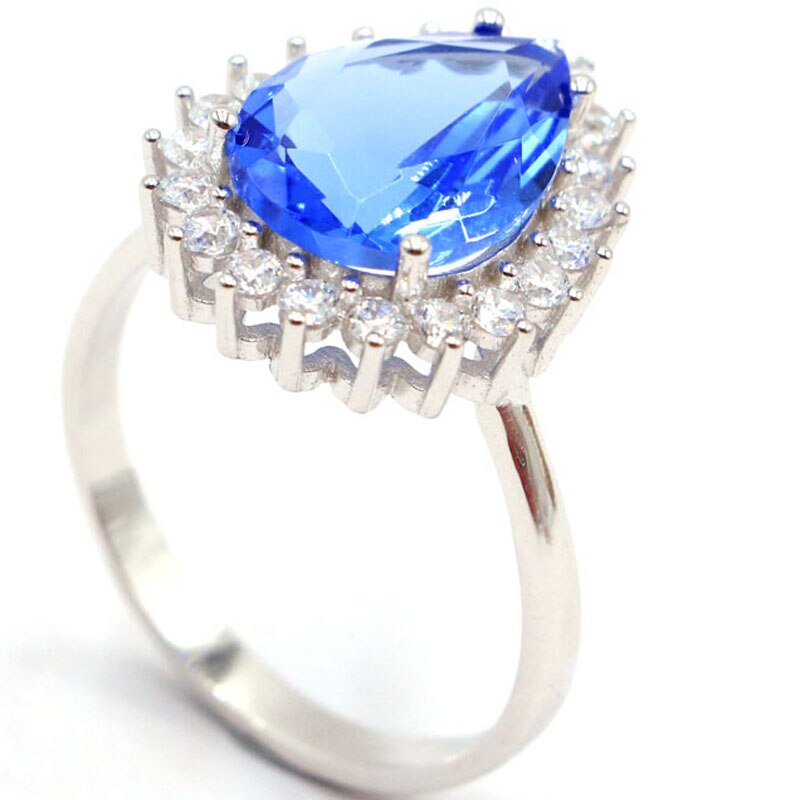 Sterling Silver Ring with Tanzanite, Tourmaline and CZ. This is a simple, clear title that fits your requested format.