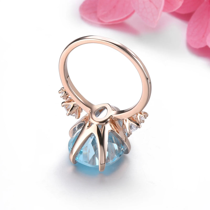 Sterling Silver Rose Gold Plated Natural Sky Blue Topaz Drop Ring