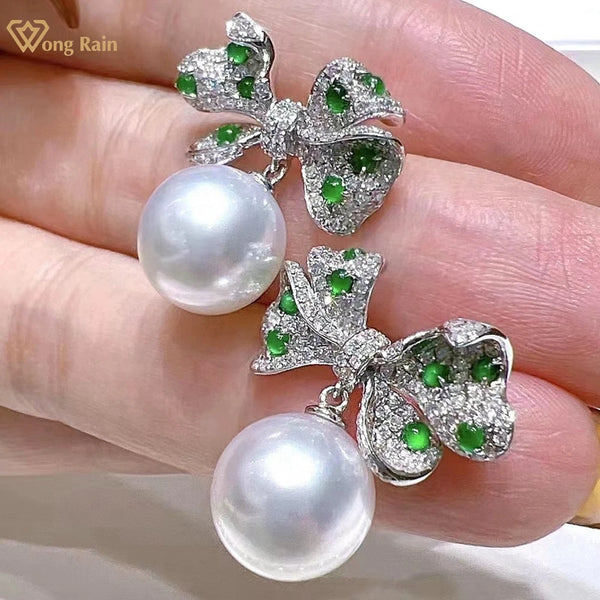 Wong Rain Luxury 925 Sterling Silver 10-11MM Natural Pearl High Carbon Diamond Gemstone Bowknot Drop Earrings Customized Jewelry