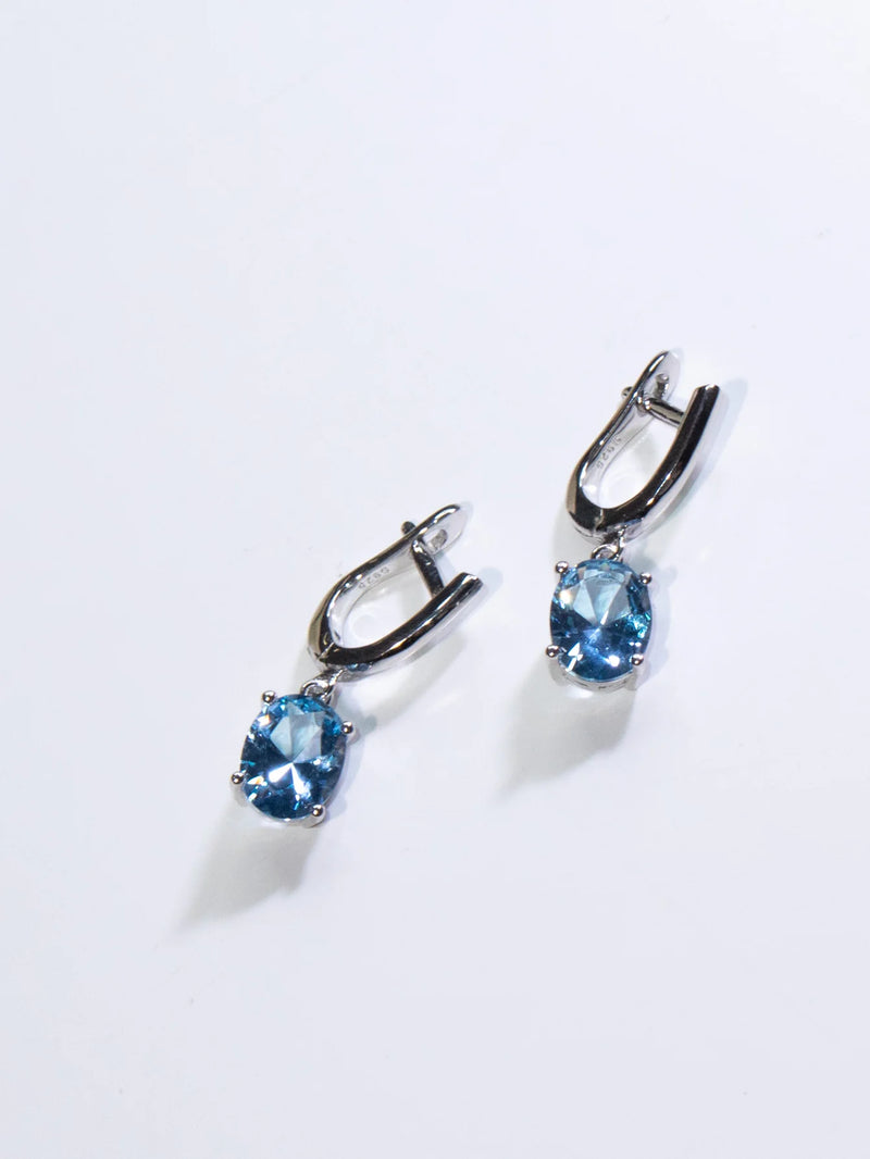 Sterling Silver Blue Topaz Oval Clip Earrings for Woman