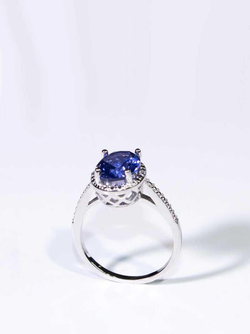 19.25ctw Tanzanite Oval Ring Prong Setting with Paved Diamonds  for Woman