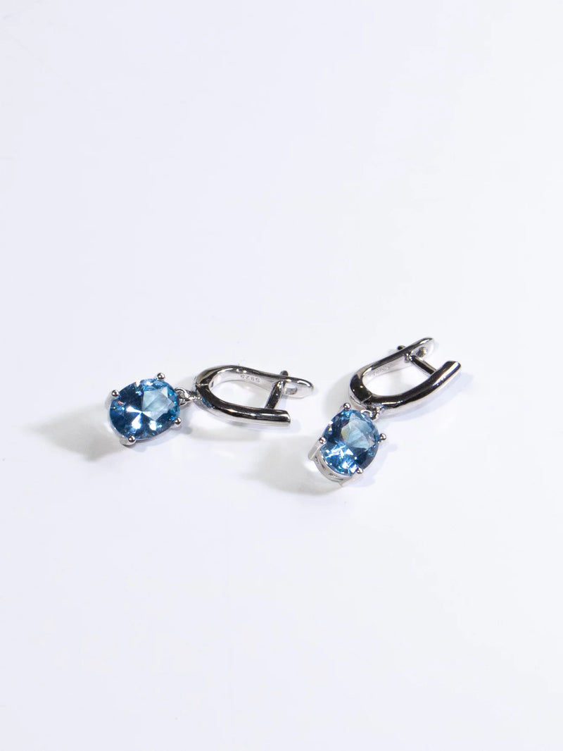 Sterling Silver Blue Topaz Oval Clip Earrings for Woman