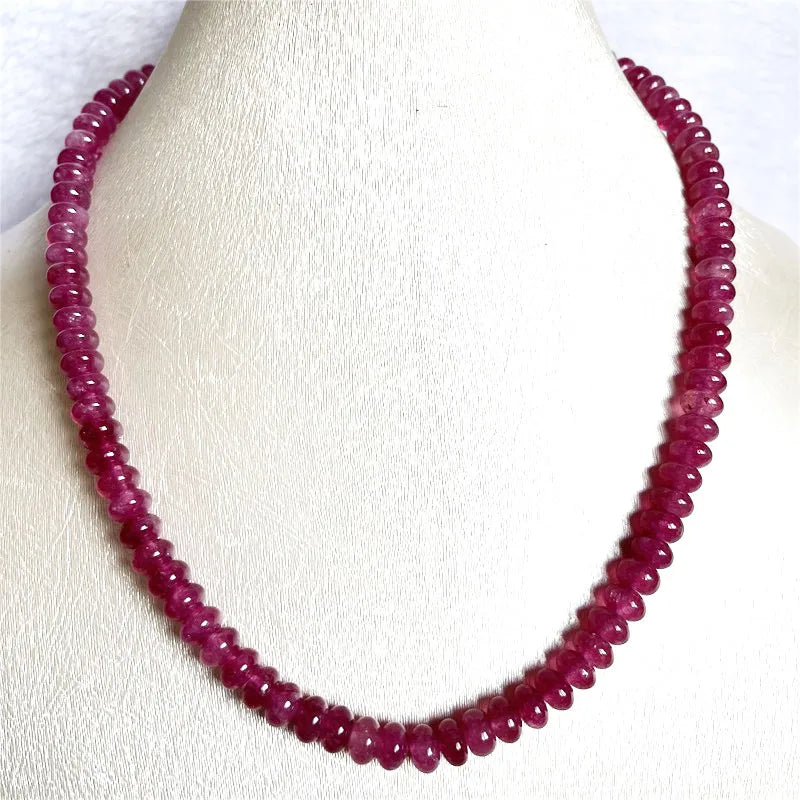 Sterling Silver Oval Pink Red Rubellite Necklace for Her Please note that this is an assumption based on common jewelry practices. Without more information about the necklace, it's impossible to be certain of the metal purity.