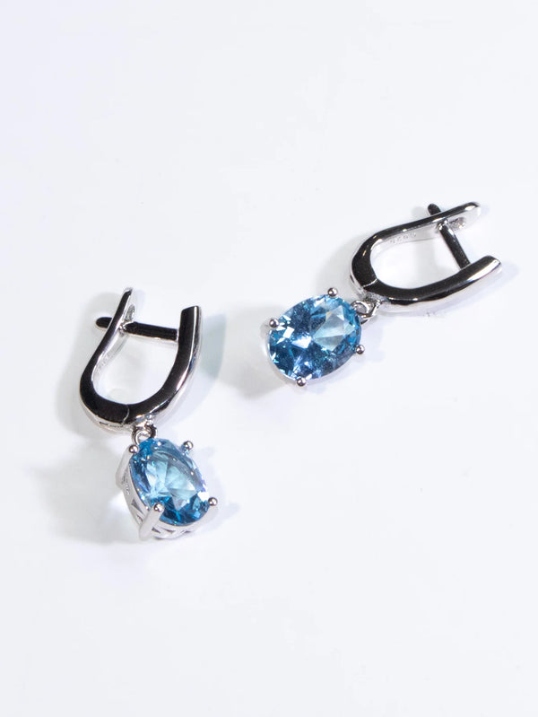 Sterling Silver Blue Topaz Oval Clip Earrings for Woman