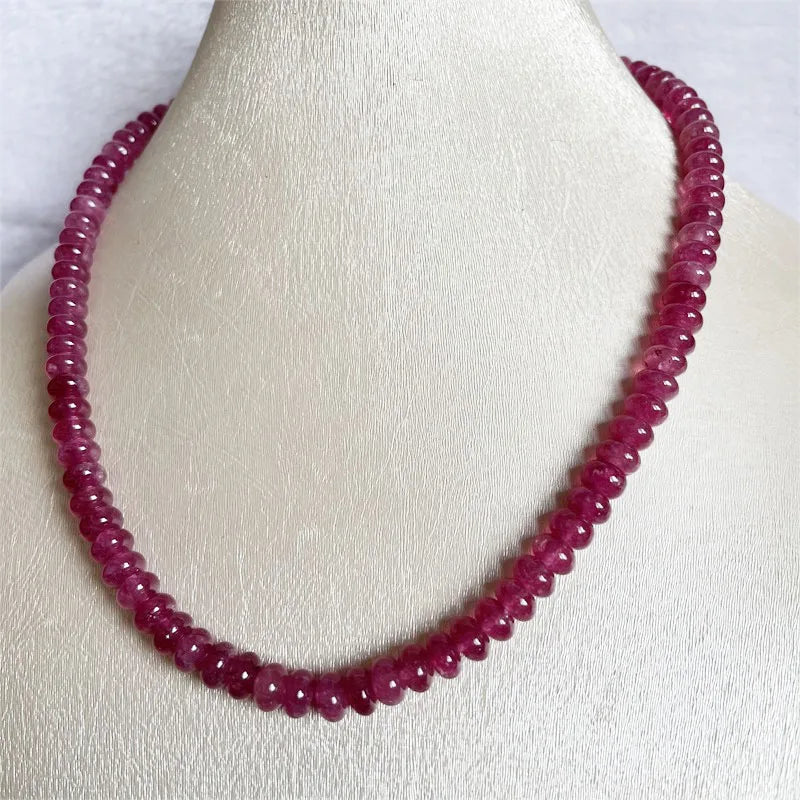 Sterling Silver Oval Pink Red Rubellite Necklace for Her Please note that this is an assumption based on common jewelry practices. Without more information about the necklace, it's impossible to be certain of the metal purity.