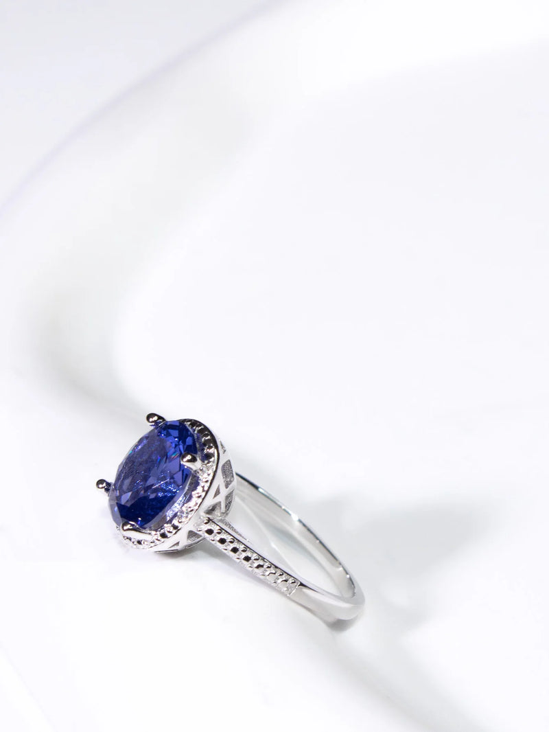 19.25ctw Tanzanite Oval Ring Prong Setting with Paved Diamonds  for Woman