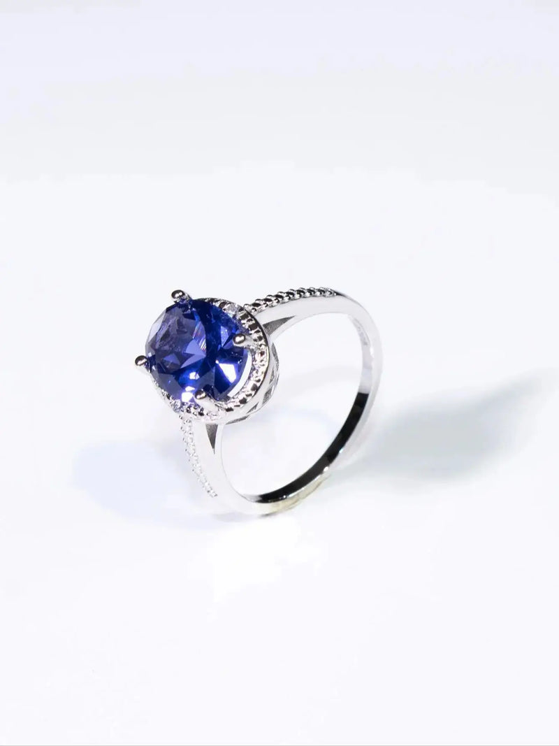 19.25ctw Tanzanite Oval Ring Prong Setting with Paved Diamonds  for Woman