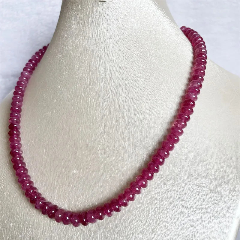 Sterling Silver Oval Pink Red Rubellite Necklace for Her Please note that this is an assumption based on common jewelry practices. Without more information about the necklace, it's impossible to be certain of the metal purity.