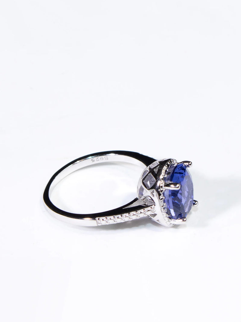 19.25ctw Tanzanite Oval Ring Prong Setting with Paved Diamonds  for Woman