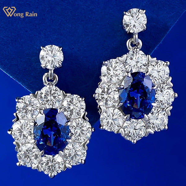 Wong Rain 925 Sterling Silver 6*8 MM Oval Sapphire High Carbon Diamond Gemstone Sparkling Drop Earrings for Women Studs Jewelry