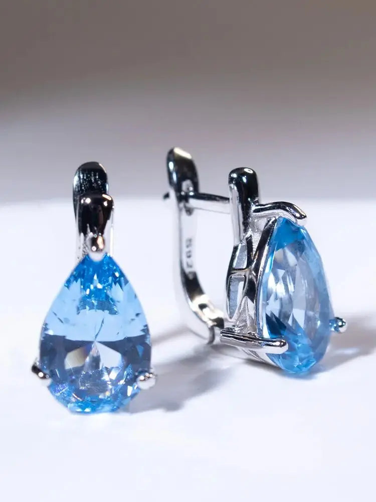 Sterling Silver Blue Topaz Pear Drop Earrings for Woman