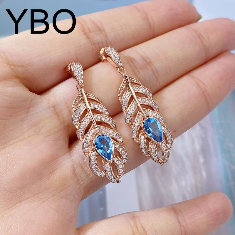 Rose Gold Plated Sterling Silver Feather Dangling Earrings with Blue Topaz for Women