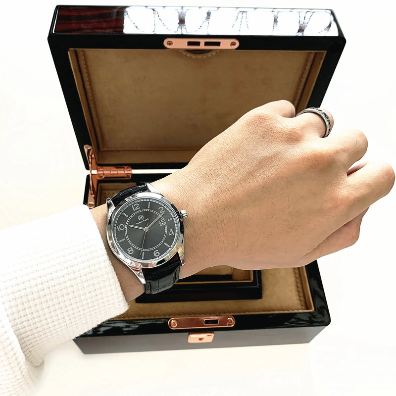 Luxury Man's Black Leather Wristwatch with Quartz Movement and Date Display.