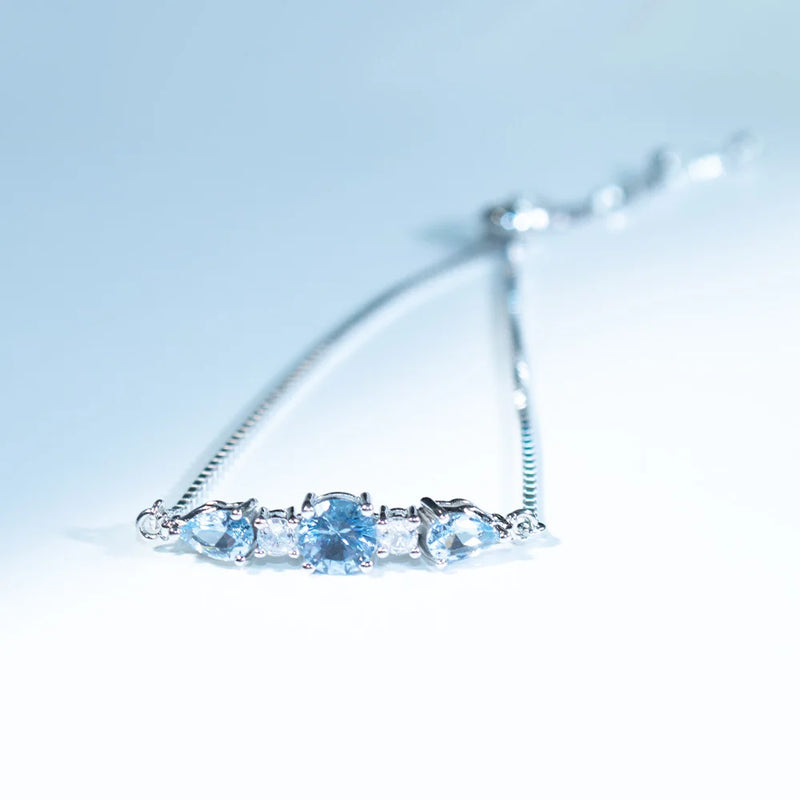 Sterling Silver Blue Topaz Adjustable Bangle Bracelet for Women