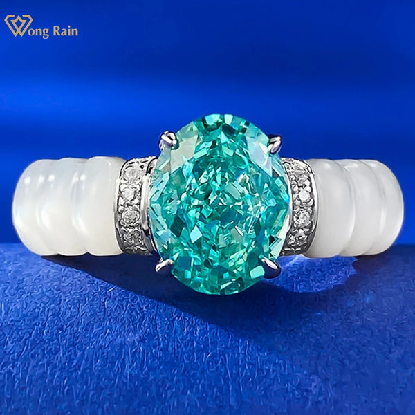 Wong Rain 925 Sterling Silver 7*9 MM Oval Lab Paraiba Tourmaline High Carbon Diamond Gemstone Ring for Women Fine Jewelry