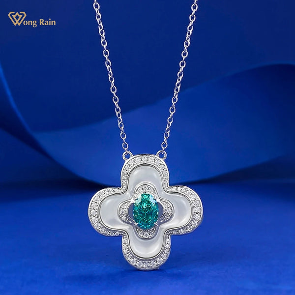 Wong Rain 925 Sterling Silver 5*7 MM Oval Paraiba Tourmaline High Carbon Diamond Gems Four-leaf Clover Pendant Necklace Jewelry