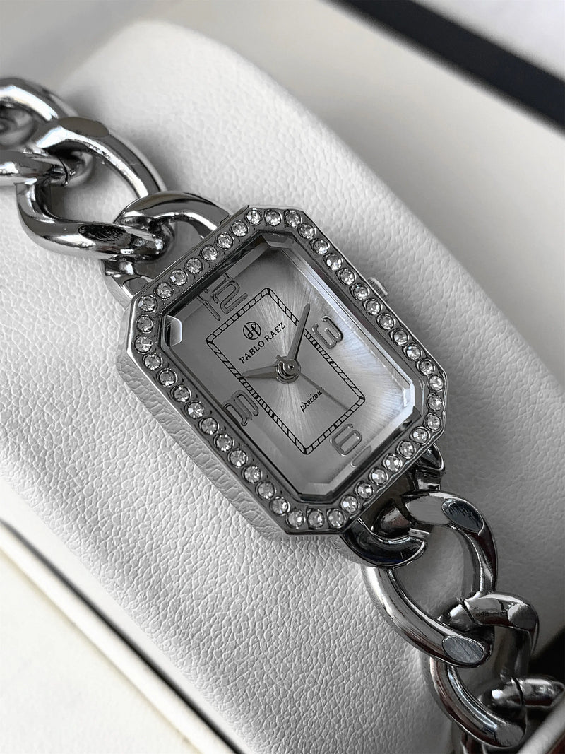 Elegant Classic Silver Wristwatch for Women - Quartz Movement & Steel Band.