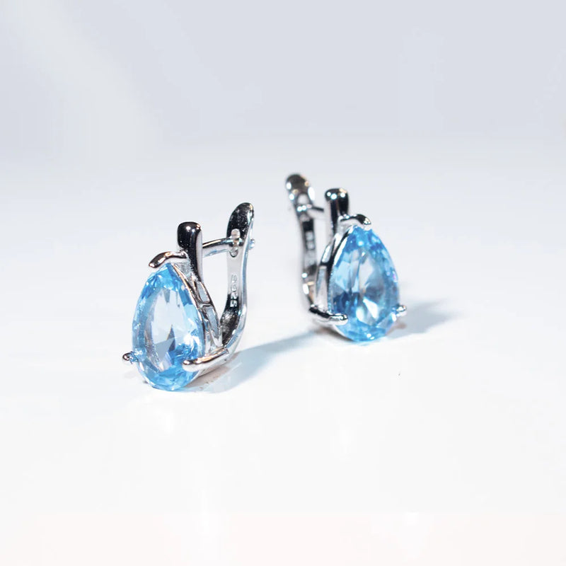 Sterling Silver Blue Topaz Pear Drop Earrings for Woman