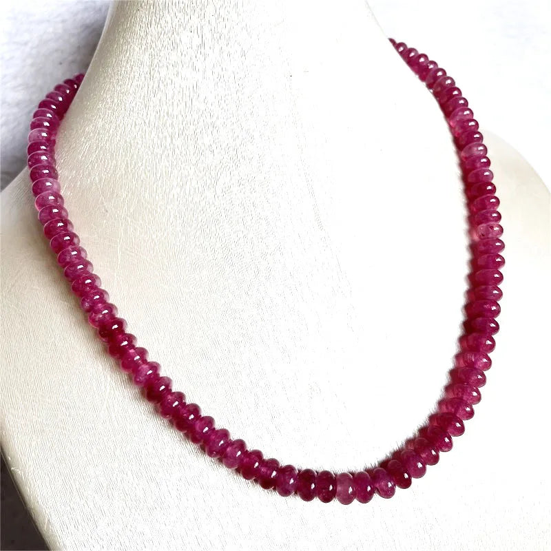 Sterling Silver Oval Pink Red Rubellite Necklace for Her Please note that this is an assumption based on common jewelry practices. Without more information about the necklace, it's impossible to be certain of the metal purity.