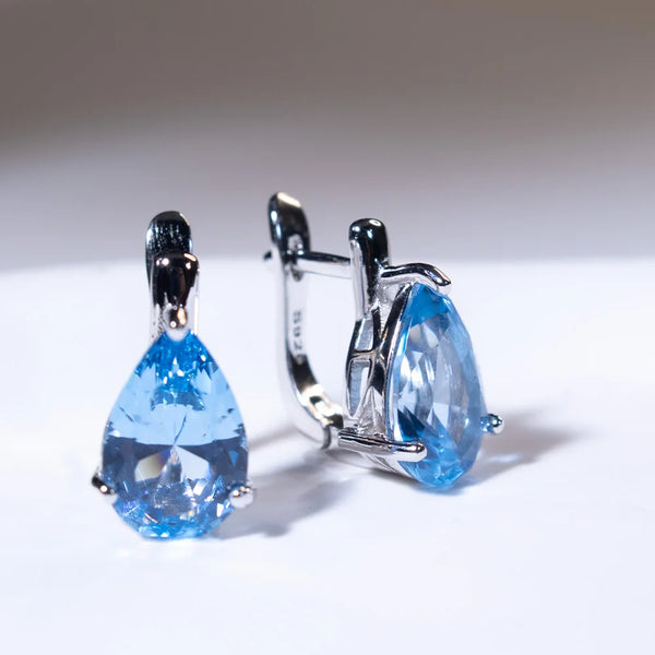 Sterling Silver Blue Topaz Pear Drop Earrings for Woman