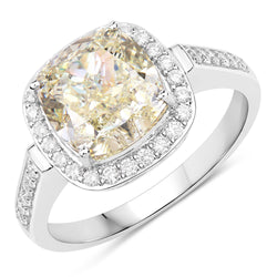 IGI Certified 4.02 Carat Genuine Light Yellow Diamond Center and 0.36cttw White Diamond 18K White Gold Ring (4.38cttw)