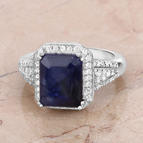 4.80 Carat Glass Filled Sapphire and White Topaz .925 Sterling Silver Ring