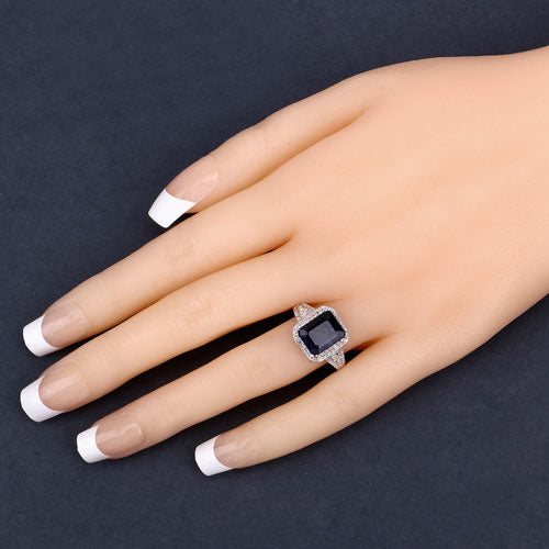 4.80 Carat Glass Filled Sapphire and White Topaz .925 Sterling Silver Ring